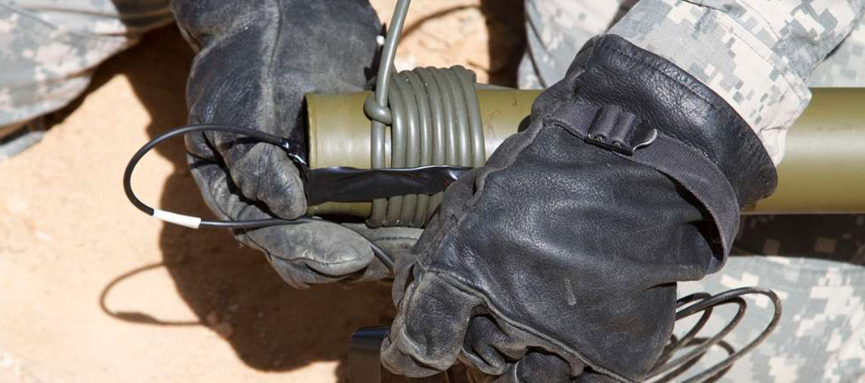 attaching blasting cap and time cord to a bangalore torpedo